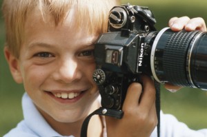 Boy with SLR camera