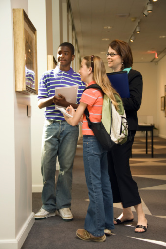 Teacher & Student looking at art