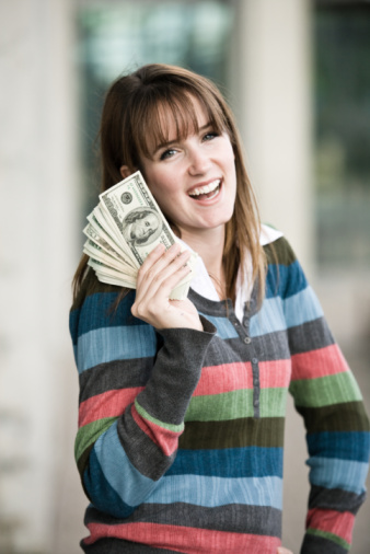 lady holding cash