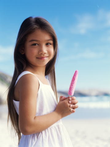 girl eating a popcicle