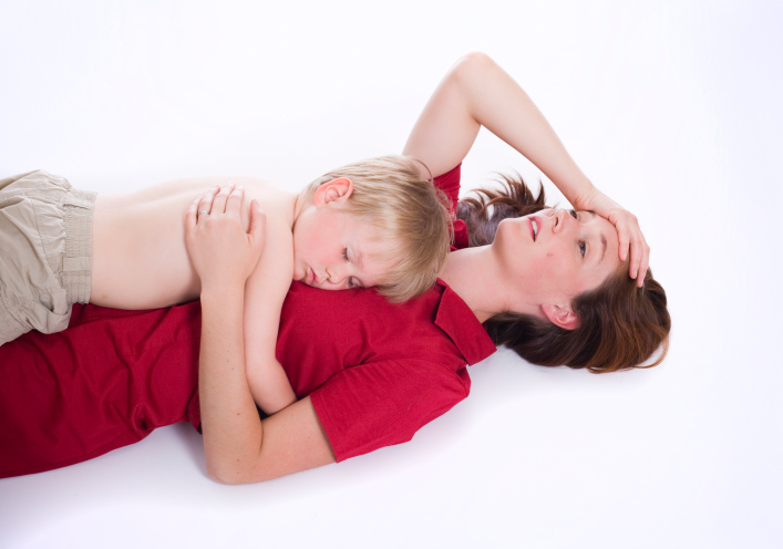 Stressed mom hugging son