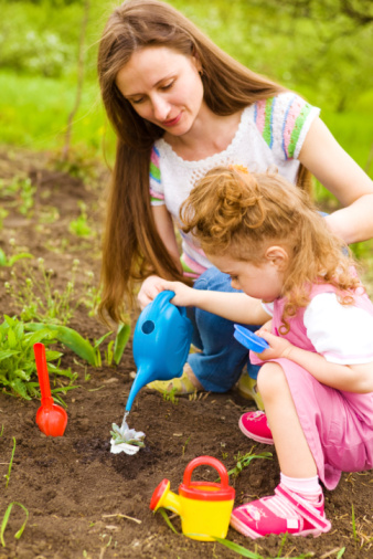 Mom and daughter gardening