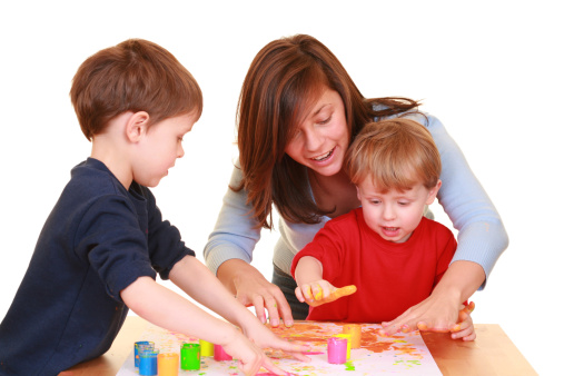 Mom playing with son's