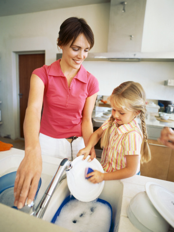 Washing dishes with mom