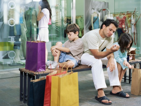 Dad shopping with kids