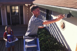 Family painting house