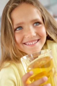 Little girl drinking juice
