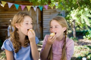 Girls eating apples