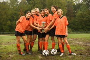 Soccer girls with trophy