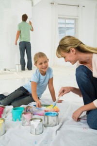 Family painting a room