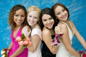 four young ladies dressed for prom